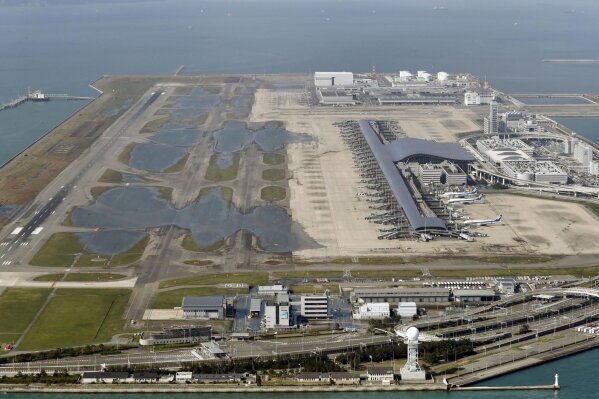Typhoon leaves major airport closed and destruction in Japan Typhoon leaves major airport closed and destruction in Japan